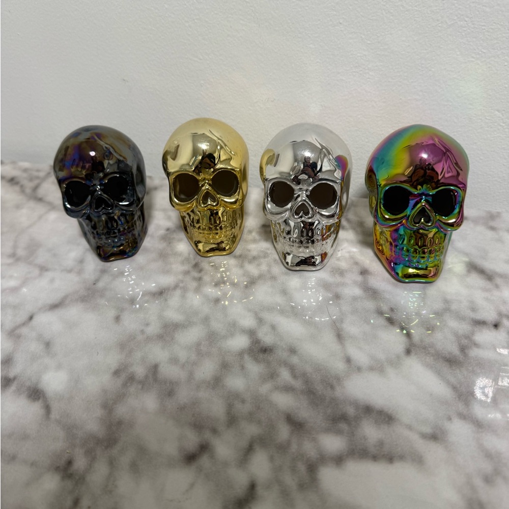 Set of Four Skull Figurines Gold, Silver Multicolor & Black